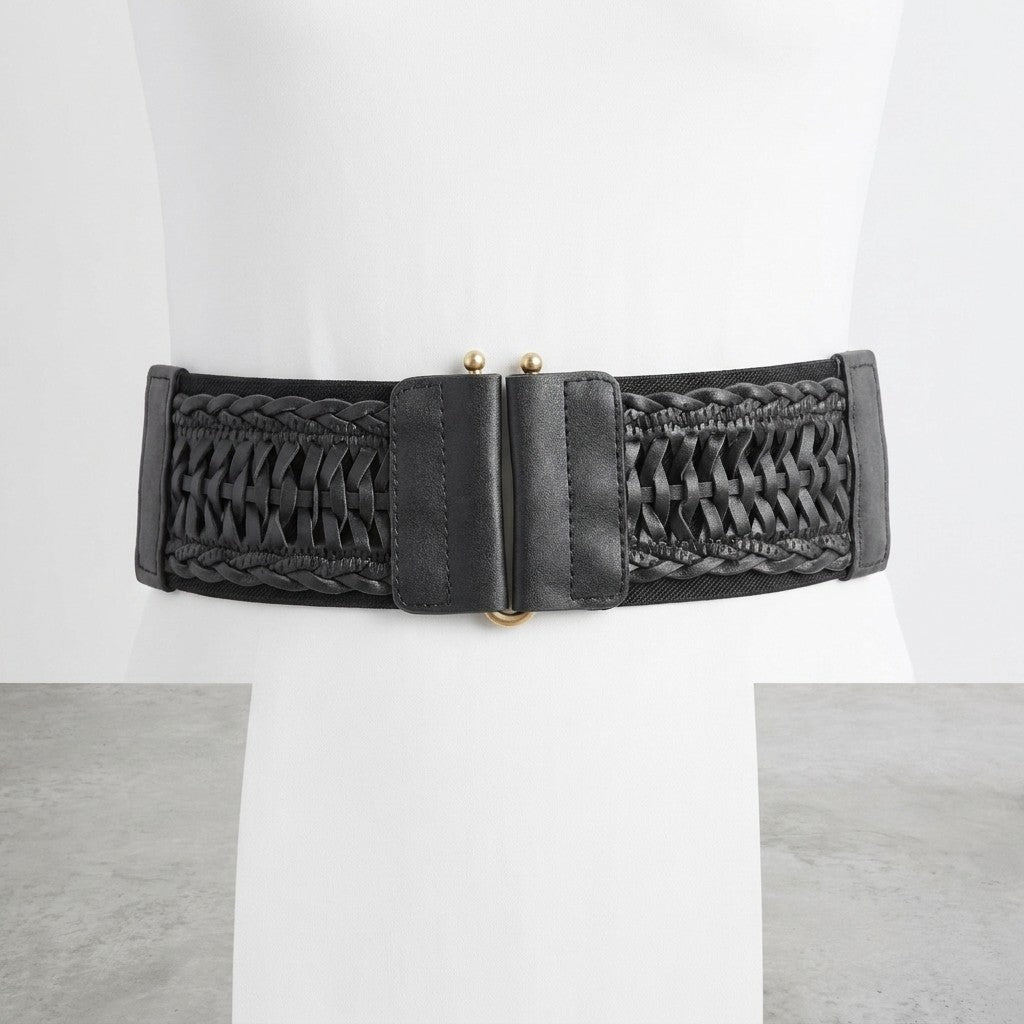 Black woven belt with golden clasp on white mannequin.