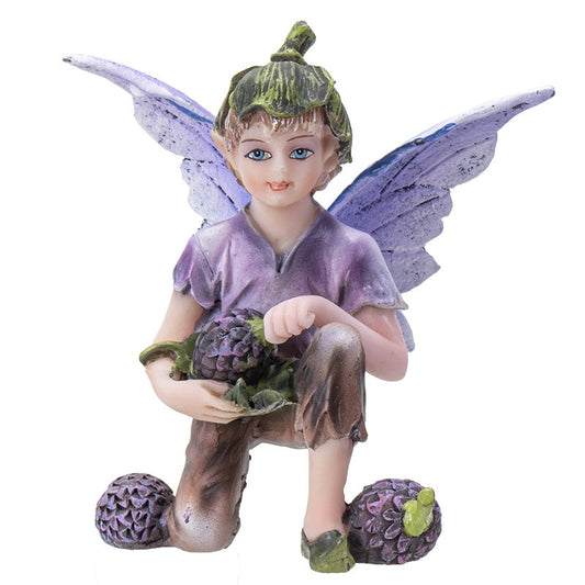 Fairy figurine with purple wings and pinecone hat, holding a pinecone.