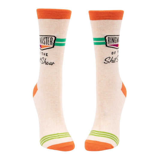 Cream socks with orange trim, green stripe, humorous text design.
