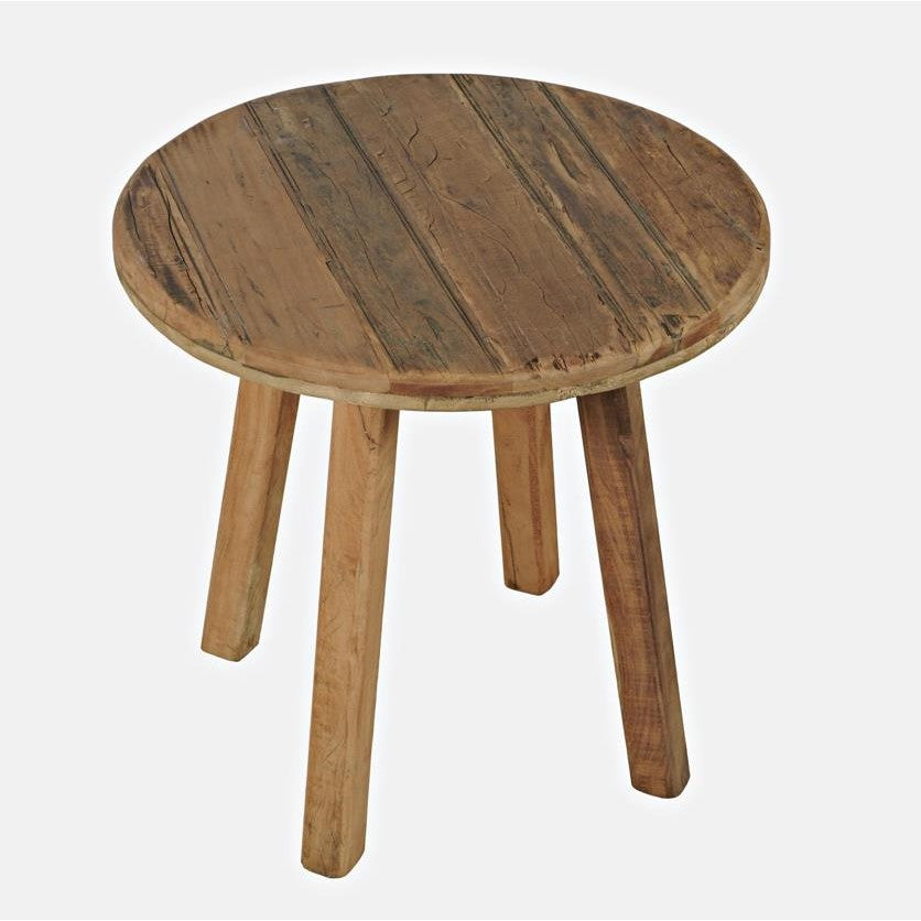 Round wooden table with four sturdy legs.