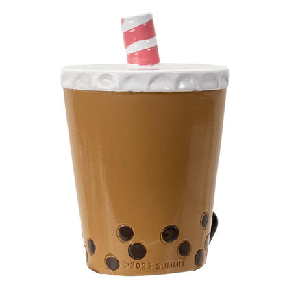 Brown bubble tea cup with black pearls and striped straw.