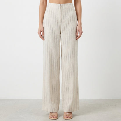 Beige pinstripe wide-leg pants on a plain background.