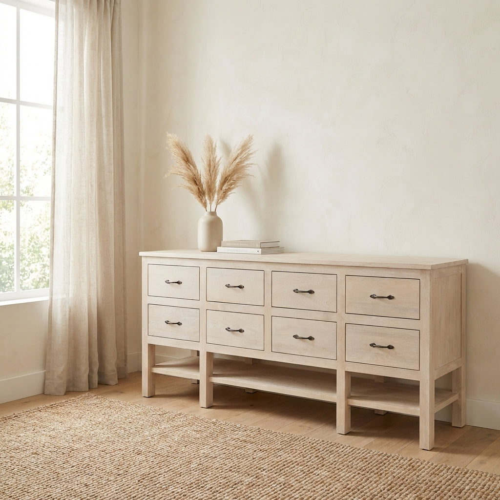 Light wood dresser with eight drawers, one slightly open.