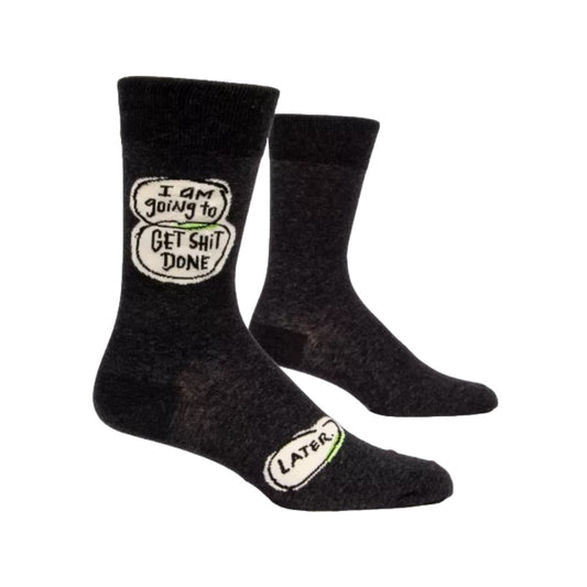 Black socks with funny motivational text patches.