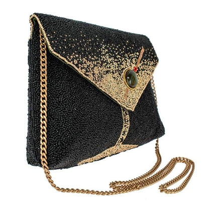 Elegant black and gold beaded clutch with a chain strap.