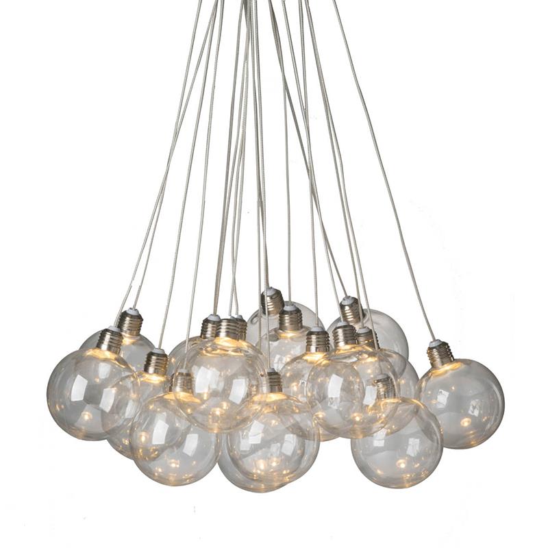 Cluster of hanging, lit spherical bulbs on white cords.