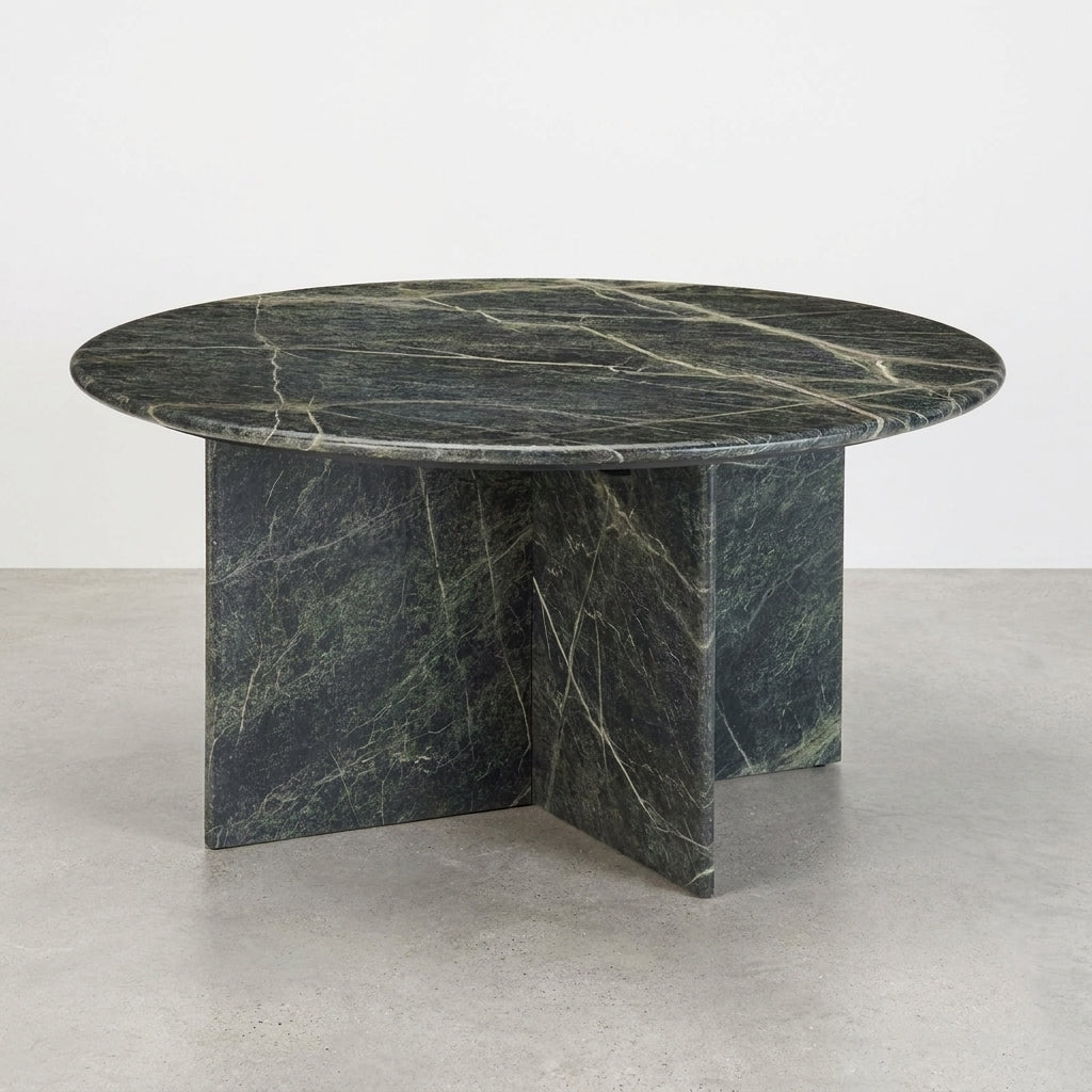 Round marble table with a dark green texture.
