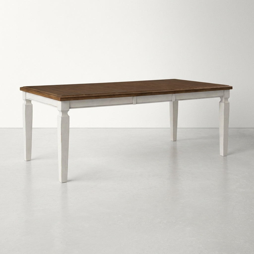 Two-toned dining table with a wooden top and white legs.
