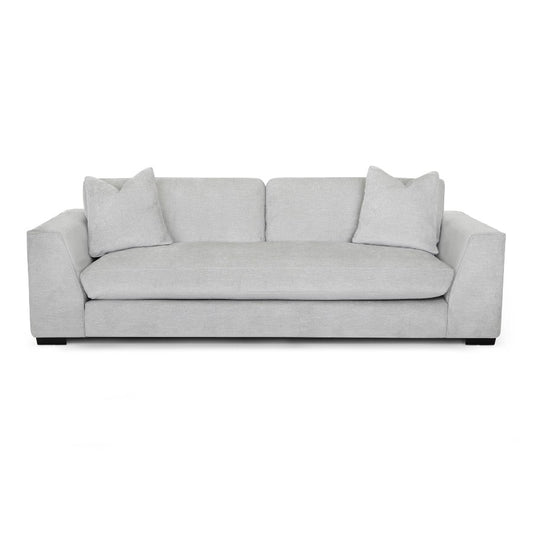 Gray modern sofa with plush cushions.