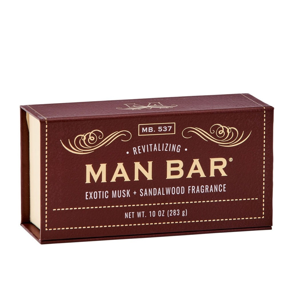 Brown box of MAN BAR soap, exotic musk and sandalwood scent.