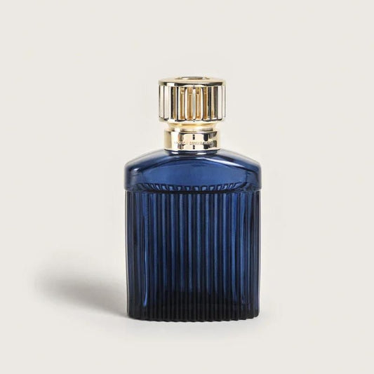 Dark blue perfume bottle with a golden cap.