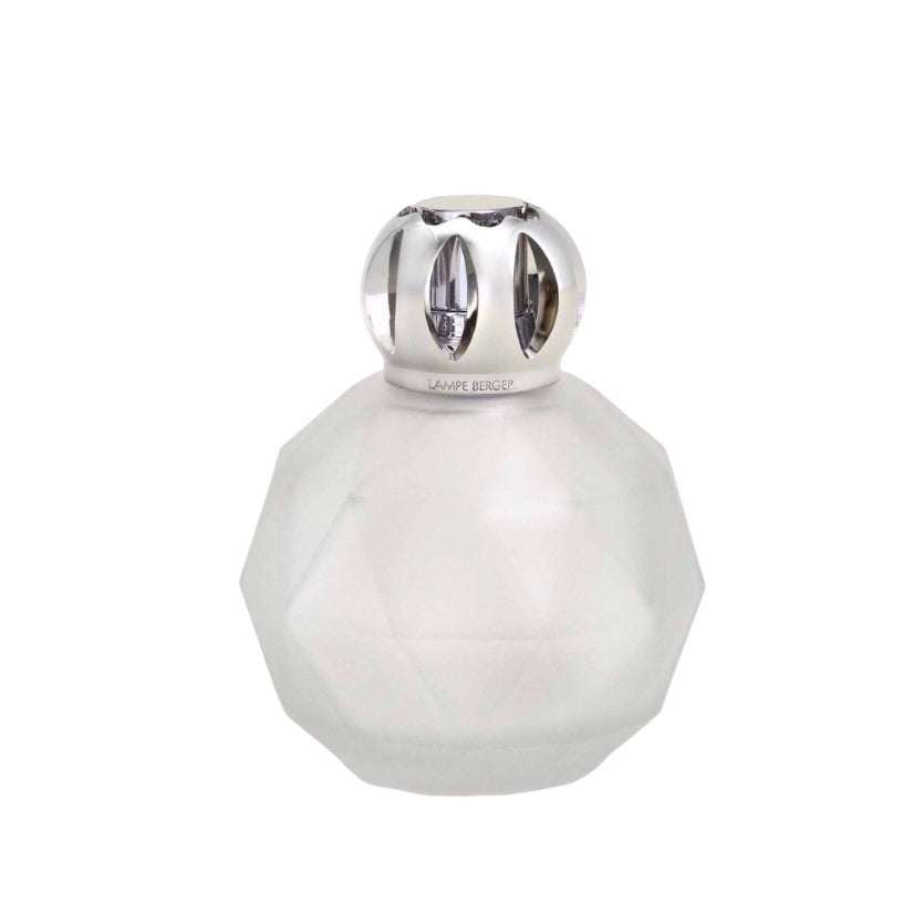 Frosted glass bottle with a geometric shape and a silver cap.