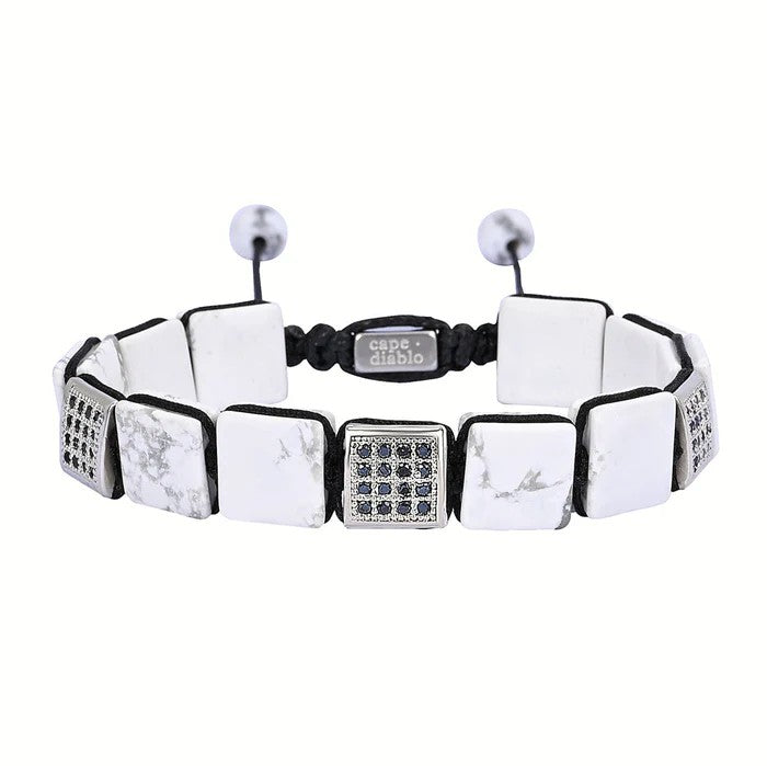 White square stone bracelet with black bead accents.