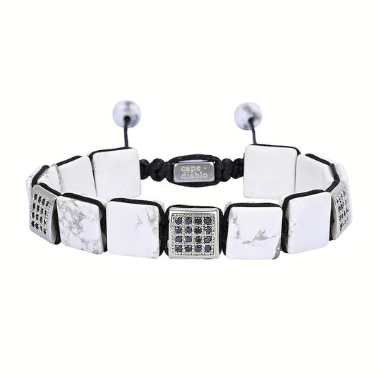 White square stone bracelet with black bead accents.