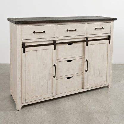 Rustic white sideboard with dark top, drawers, and sliding barn doors.