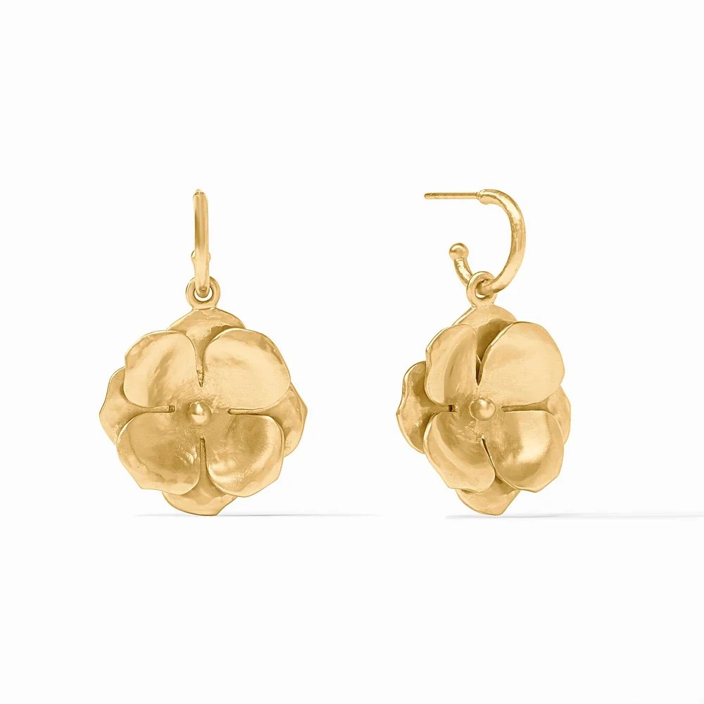 Pair of gold flower-shaped earrings displayed against a white background.
