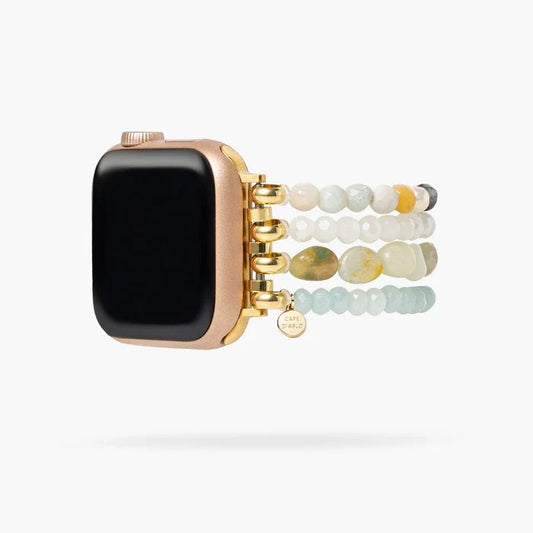 Smartwatch with a gold case and multi-bead bracelet strap.