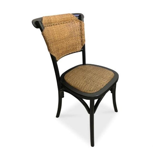 Black chair with woven rattan seat and backrest.