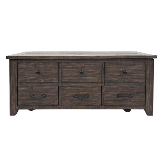 Dark wooden dresser with six drawers and rustic handles.