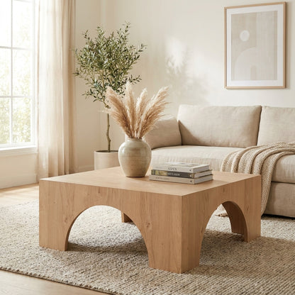 Square wooden table with arch-shaped cutouts.