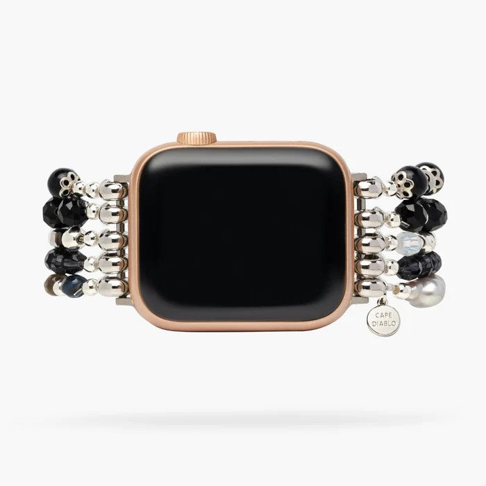 Rose gold smartwatch with beaded bracelet band.