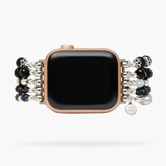 Rose gold smartwatch with beaded bracelet band.