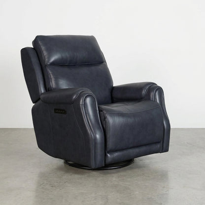 Black leather recliner chair on a concrete floor.