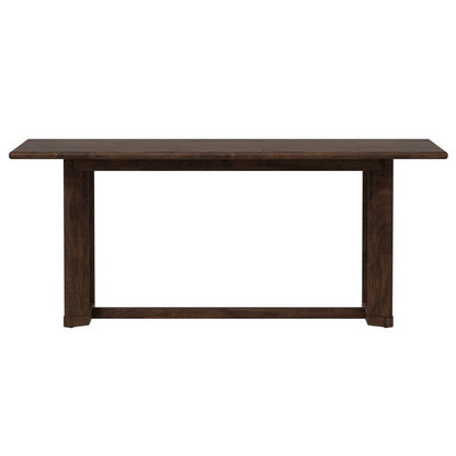 Wooden rectangular table with a minimalist design.