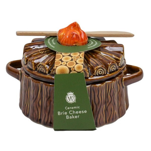 Ceramic brie cheese baker with lid and wooden spreader.
