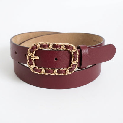Maroon belt with gold chain buckle on a white background.