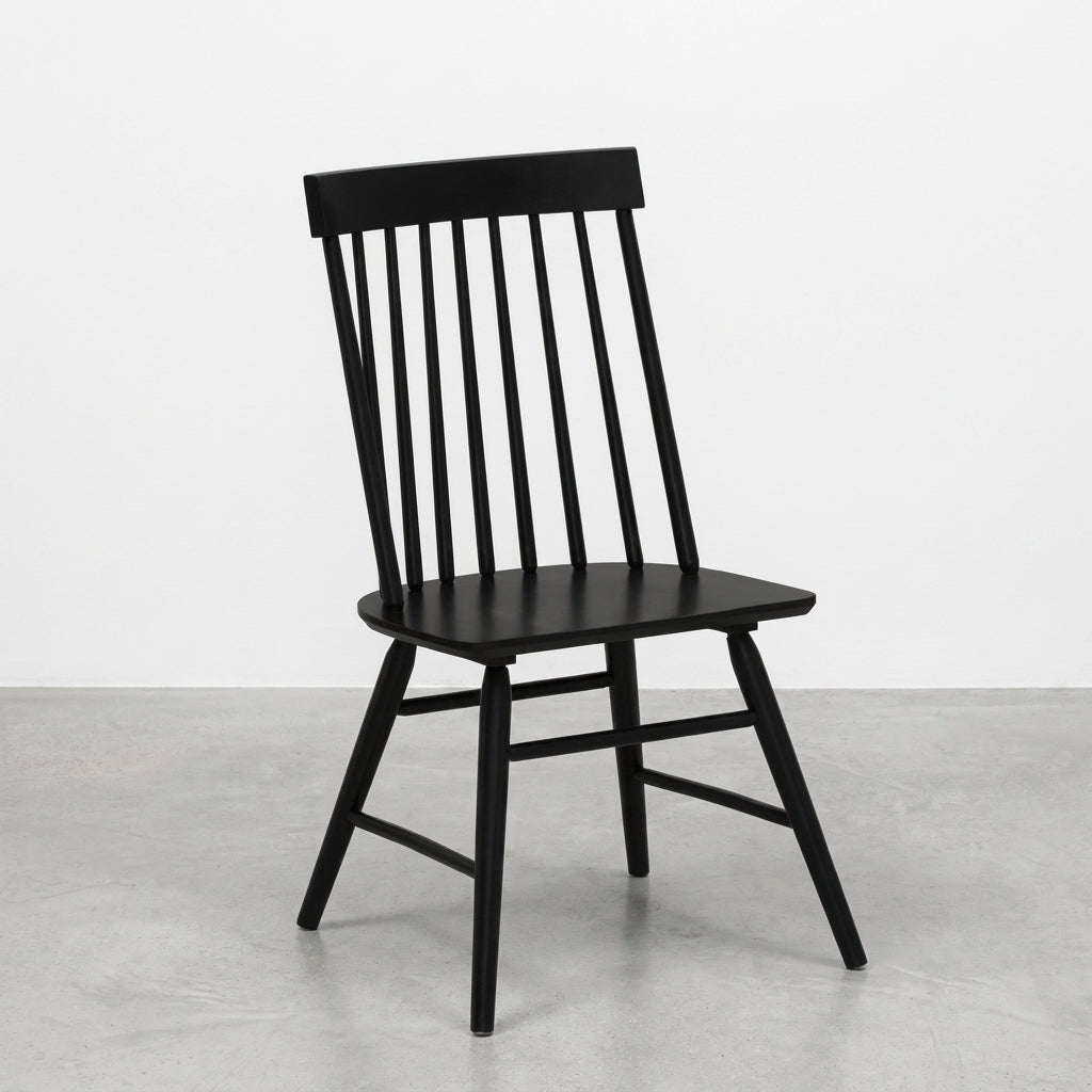 Black wooden chair with slatted backrest.