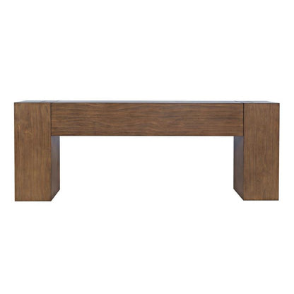 Wooden rectangular table, minimalist design, with thick legs and a solid top.