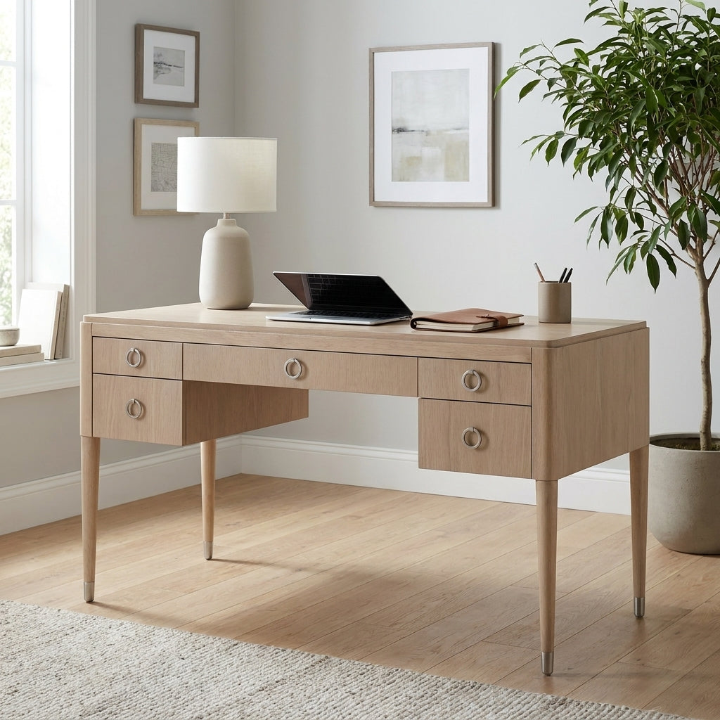 Light wood desk with five drawers and slender legs.