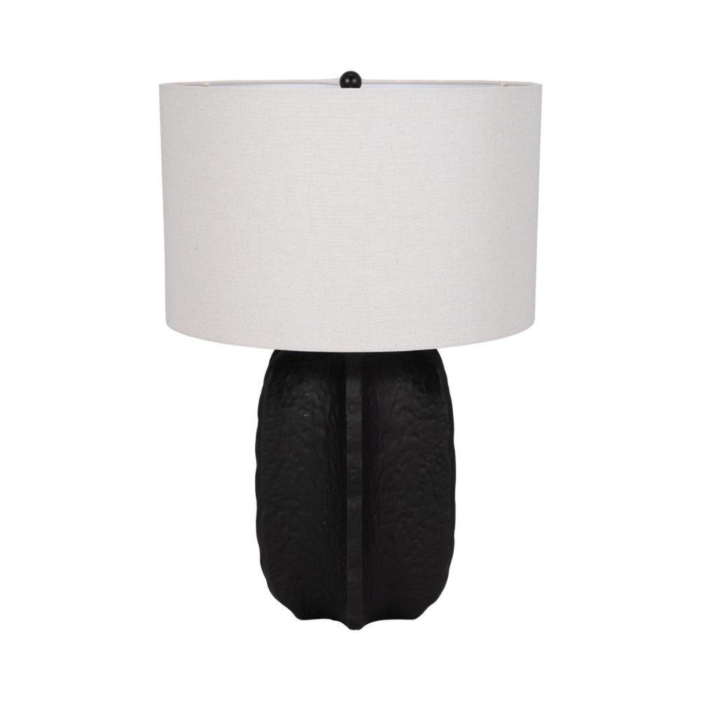 Modern table lamp with black textured base and white fabric shade.
