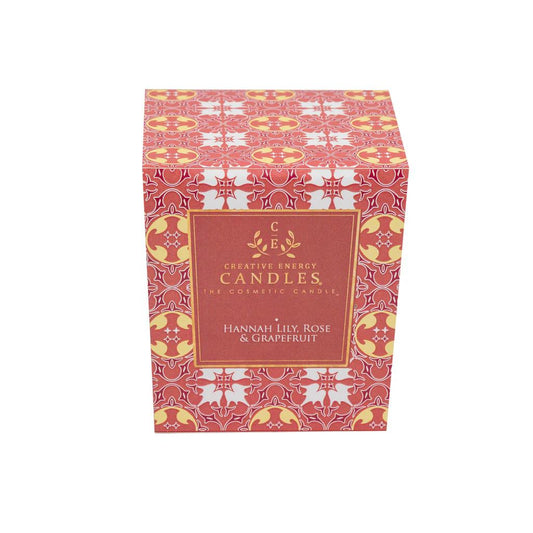 Ornate candle box with pink and gold patterns, labeled "Creative Energy Candles."
