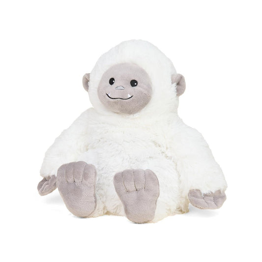 Fluffy white yeti plush with a smiling face.