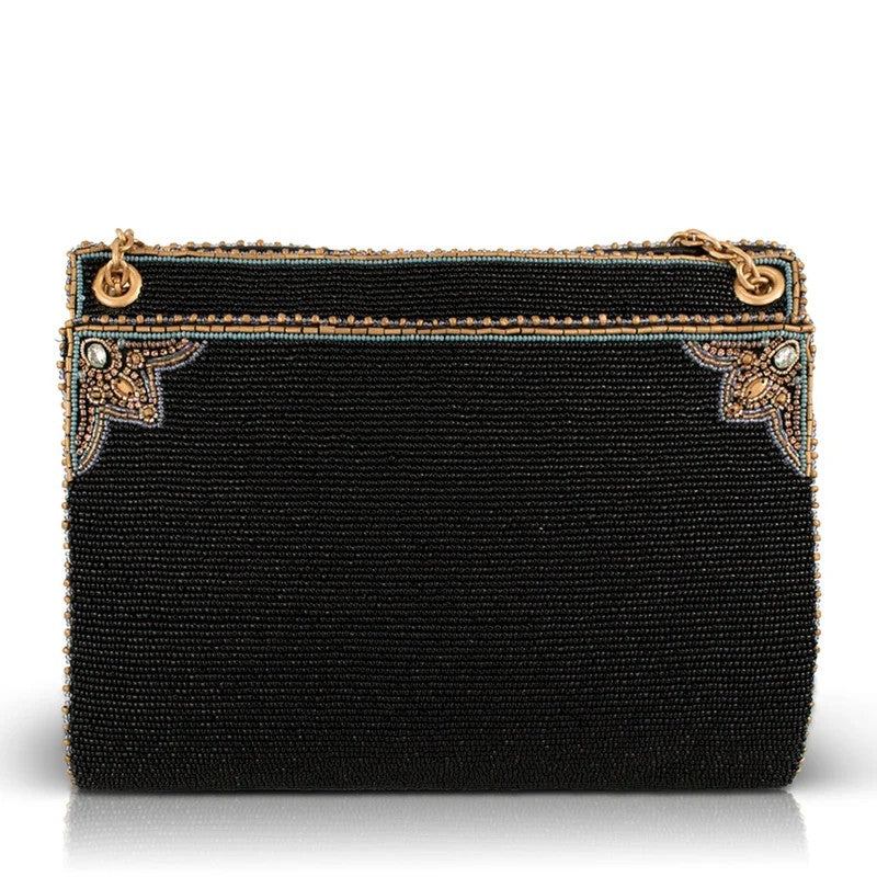 Elegant beaded black clutch with intricate gemstone accents.