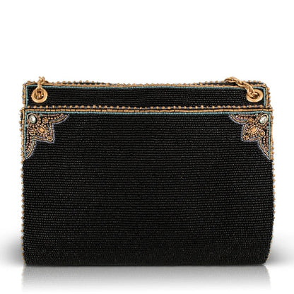 Elegant beaded black clutch with intricate gemstone accents.