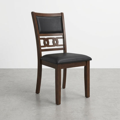 Wooden chair with black cushioned seat and backrest.