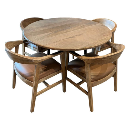 Round wooden table with four matching chairs.