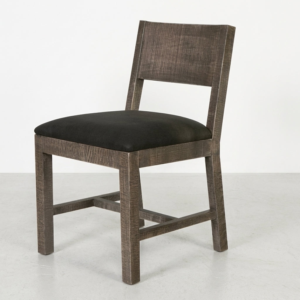 Wooden chair with dark seat and simple, modern design.