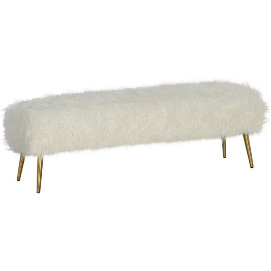 Fuzzy white bench with gold legs.