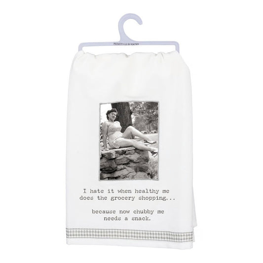 Towel with a vintage photo and humorous text about grocery shopping and snacking.