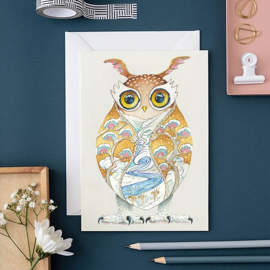 Artistic owl card with nature patterns, pencils, flowers, and clips.