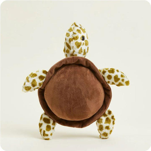 Plush turtle toy with a brown shell and spotted limbs on a plain background.