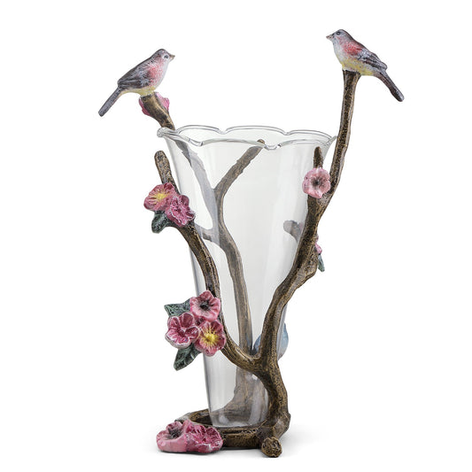 Elegant glass vase with bird and flower accents.