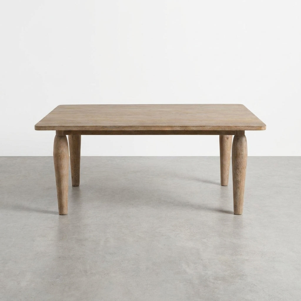 Rectangular wooden table with rounded legs.