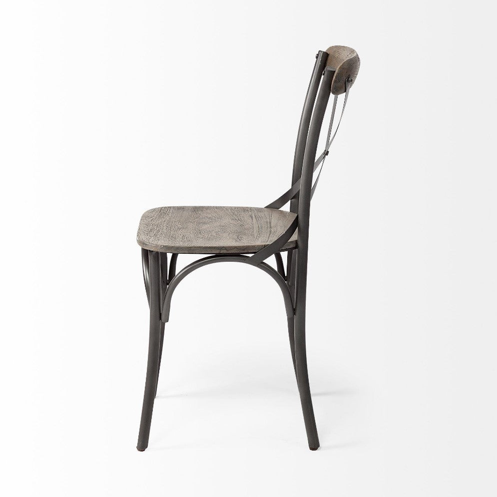 Side view of a gray metal chair with a wooden seat and backrest.