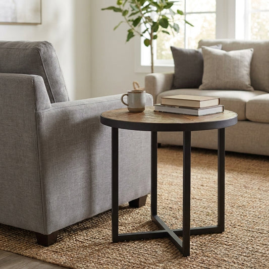 Round wooden table with a metal cross-leg base.