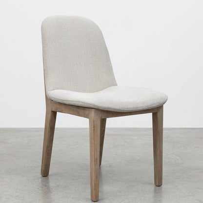 Wooden chair with a light gray cushioned seat and backrest.